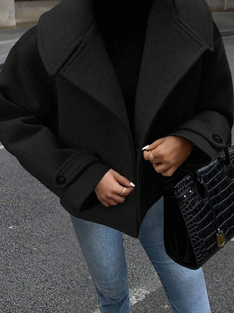 Oversized jas met brede revers en dubbele knoopsluiting voor dames in zwart