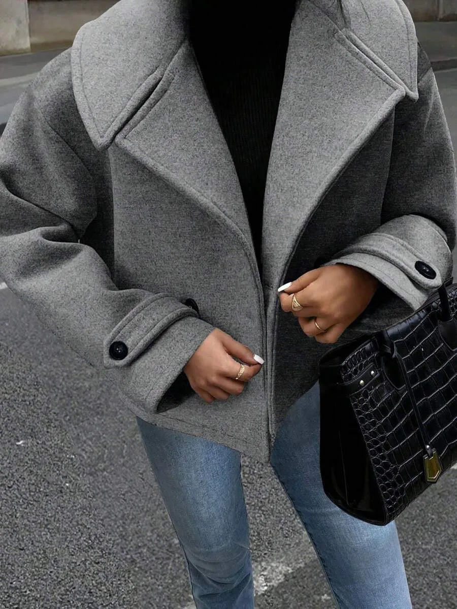 Oversized jas met brede revers en dubbele knoopsluiting voor dames in grijs