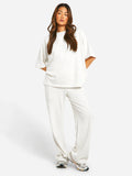 Oversized set met korte mouwen en wijde broek voor dames in wit