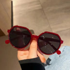 Oversized zonnebril met geometrisch montuur voor dames in rood