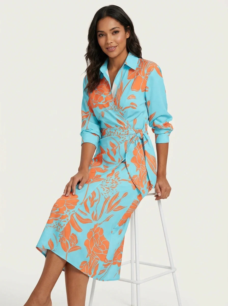 Overslagjurk met print en tailleband in licht blauw