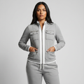 Set met getailleerd ritsjack en contrastbies voor dames in grijs