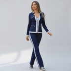 Set met getailleerd ritsjack en contrastbies voor dames in blauw