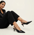 Slingback hakken met slangenprint en puntige neus