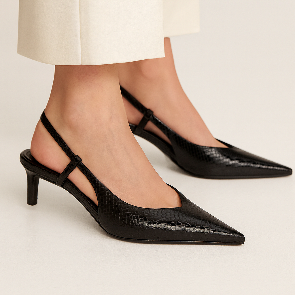 Slingback hakken met slangenprint en puntige neus