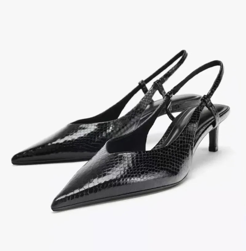 Slingback hakken met slangenprint en puntige neus