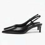 Slingback hakken met slangenprint en puntige neus
