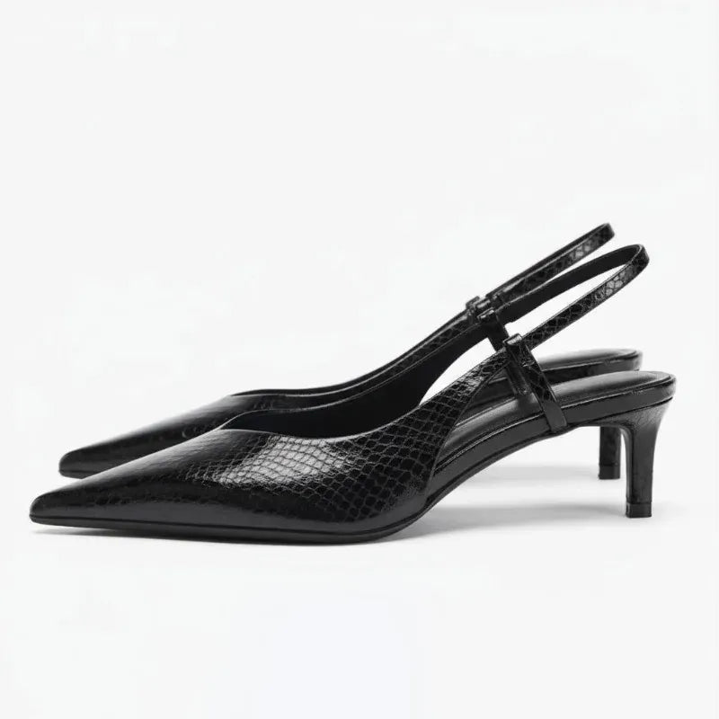 Slingback hakken met slangenprint en puntige neus