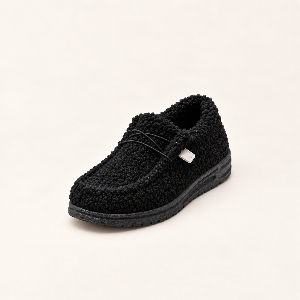 Slippers met teddyvoering en zachte instap voor dames in zwart