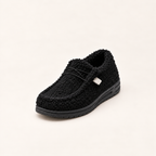Slippers met teddyvoering en zachte instap voor dames in zwart