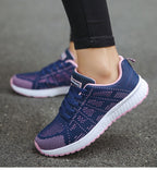 Sneakers met mesh bovenwerk en schokdempende zool voor dames