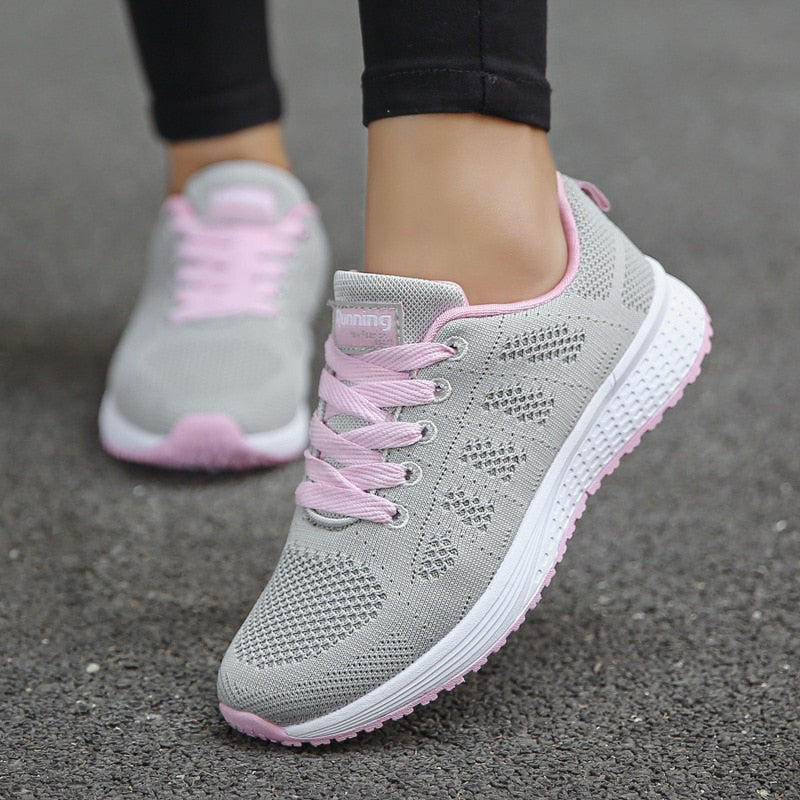 Sneakers met mesh bovenwerk en schokdempende zool voor dames in grijs-roze