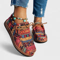 Sneakers met artistiek patroon en stevige zool in rood