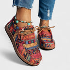 Sneakers met artistiek patroon en stevige zool in rood