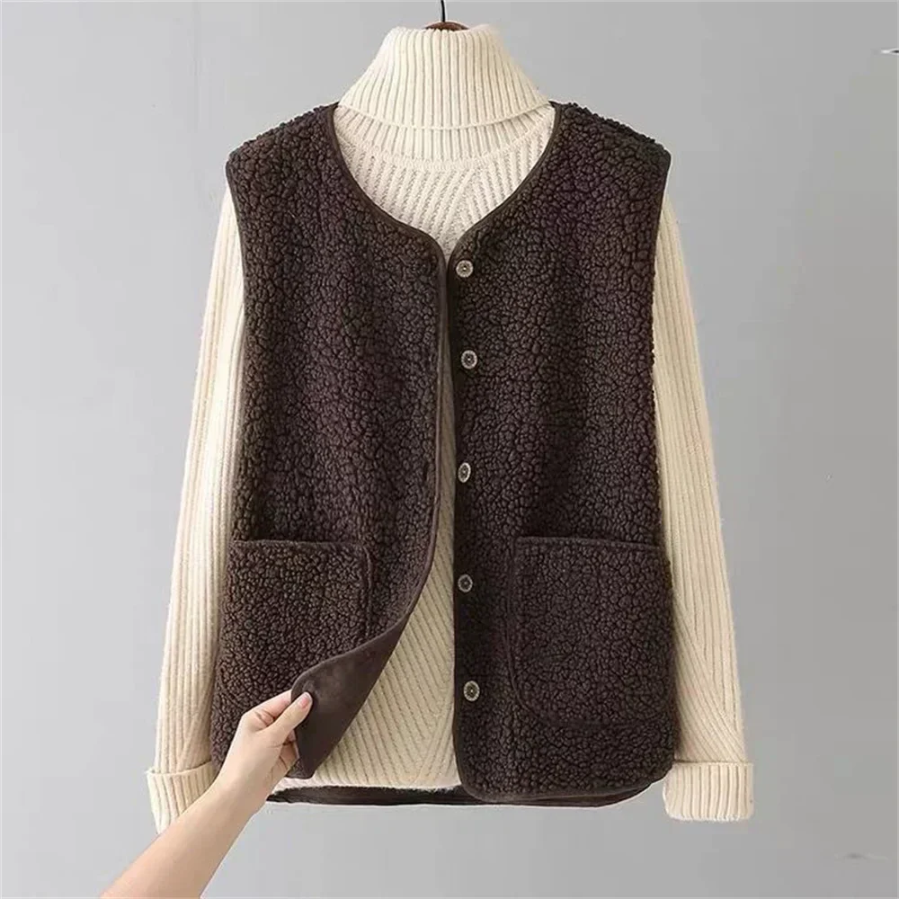 Teddy gilet met V-hals en voorzakken voor dames