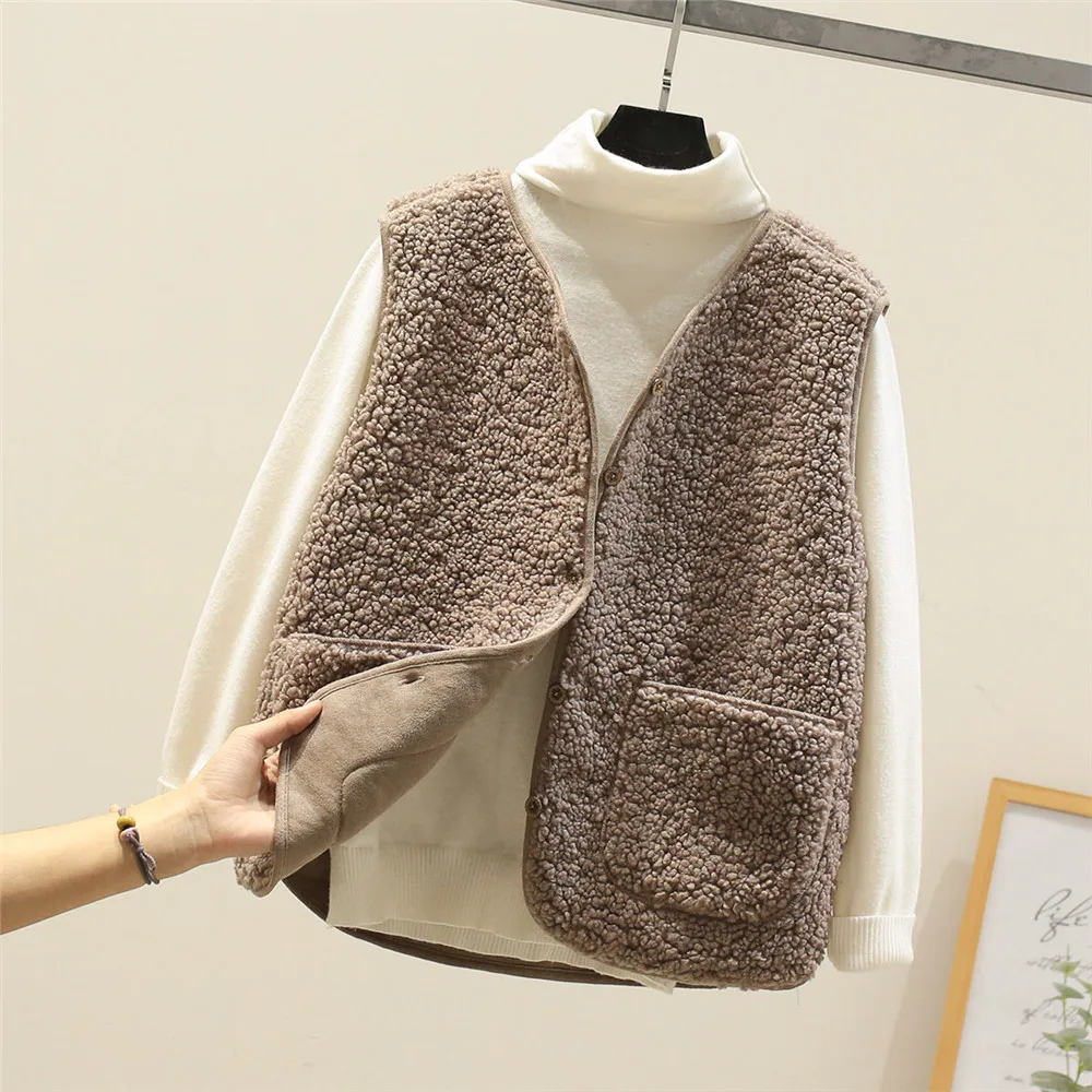 Teddy gilet met V-hals en voorzakken voor dames