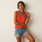 Top met knoopdetail en ronde hals in oranje