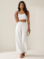 Wide leg broek met elastische taille en trekkoord in wit