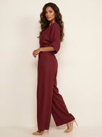 Wide-leg jumpsuit met V-hals en brede tailleband voor dames