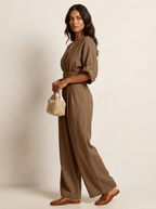 Wide-leg jumpsuit met V-hals en brede tailleband voor dames