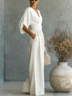 Wide-leg jumpsuit met V-hals en brede tailleband voor dames