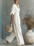 Wide-leg jumpsuit met V-hals en brede tailleband voor dames