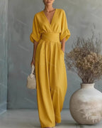 Wide-leg jumpsuit met V-hals en brede tailleband voor dames