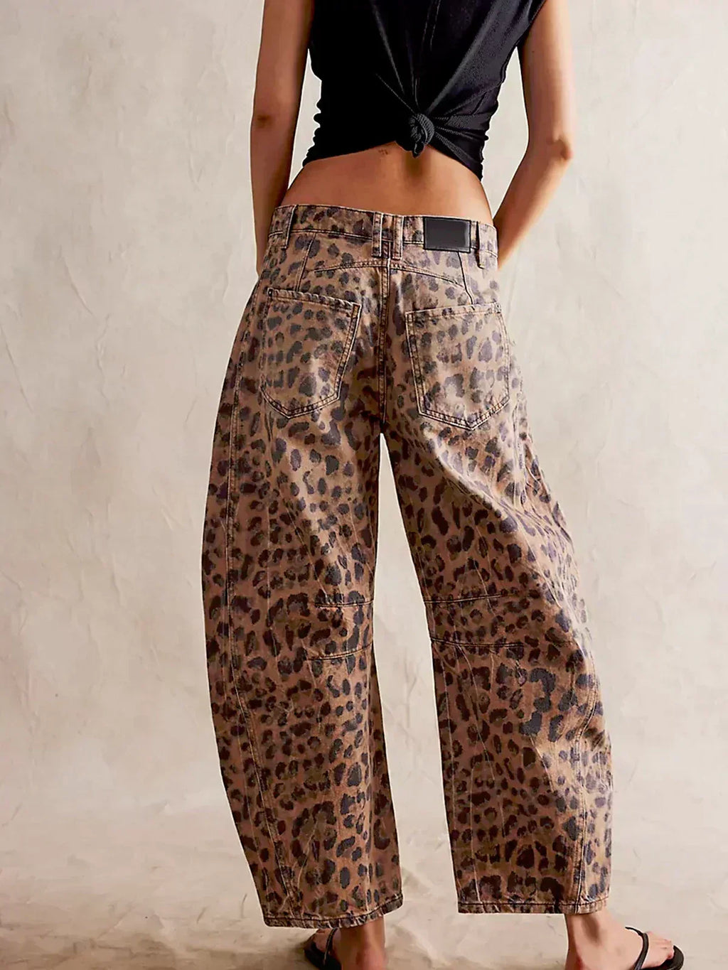 Wijde broek met luipaardprint en riemlussen voor dames