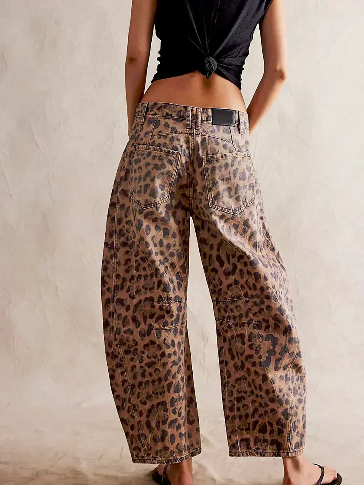 Wijde broek met luipaardprint en riemlussen voor dames