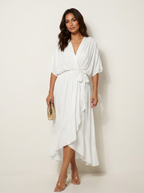 Maxi jurk met V-hals en strikdetail in wit