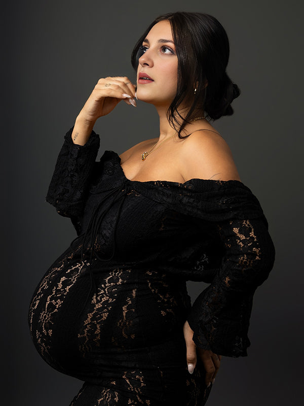 Zwangerschapsjurk met off-shoulder boothals en ruches in zwart