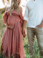 Zwangerschapsjurk met off-shoulder hals en gedrapeerde ruches in roze