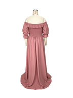Zwangerschapsjurk met off-shoulder hals en gedrapeerde ruches in roze
