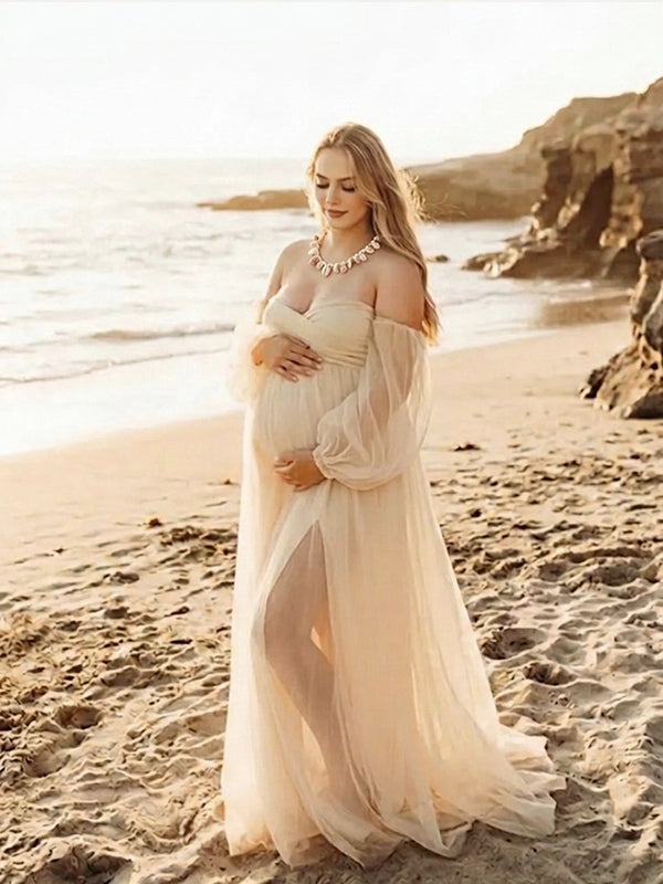 Zwangerschapsjurk met off-shoulder V-hals en tule in abrikoos